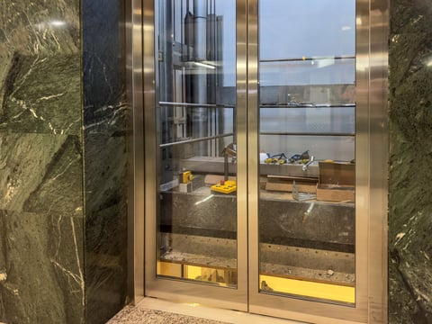 Modern glass elevator doors